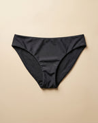 Bikini menstrual Apparelle negro visto en detalle, tejido sin costuras con acabado anthracite — packshot anchor