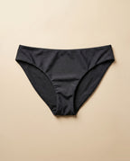 Bikini menstrual Apparelle negro visto en detalle, tejido sin costuras con acabado anthracite — packshot anchor