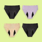 Pack de cuatro braguitas menstruales Apparelle Signature en negro, lavanda y beige sobre fondo lima